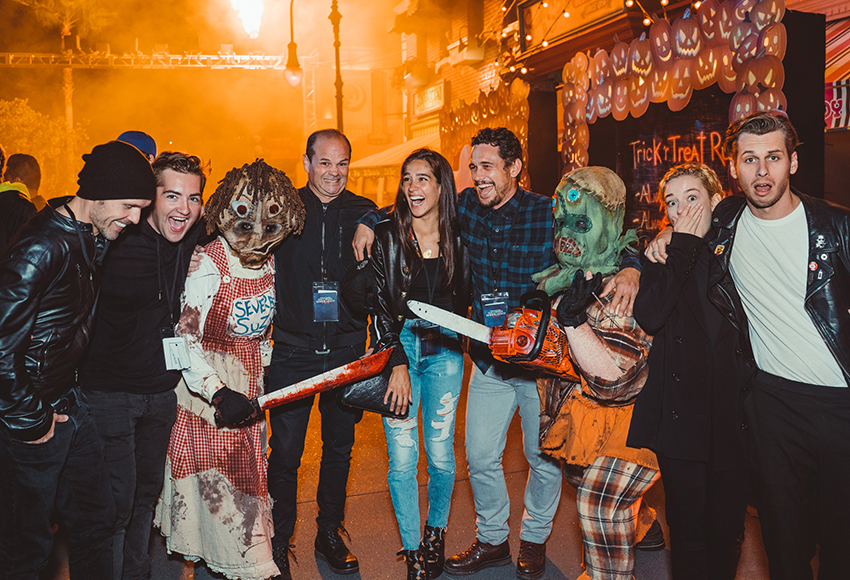 (L-R) Scott Haze, Michael Gandolfini, Chris Bauer, Isabel Pakzad, James Franco, Julia Garner, and Mark Foster encounter some frightful fiends at "Halloween Horror Nights" at Universal Studios Hollywood on Saturday, October 6, 2018. Credit: Mike Danenberg / Universal Studios Hollywood
